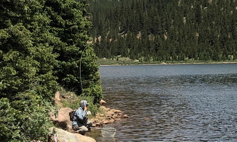 Angel Cruz working a high altitude lake somewhere in Colorado.